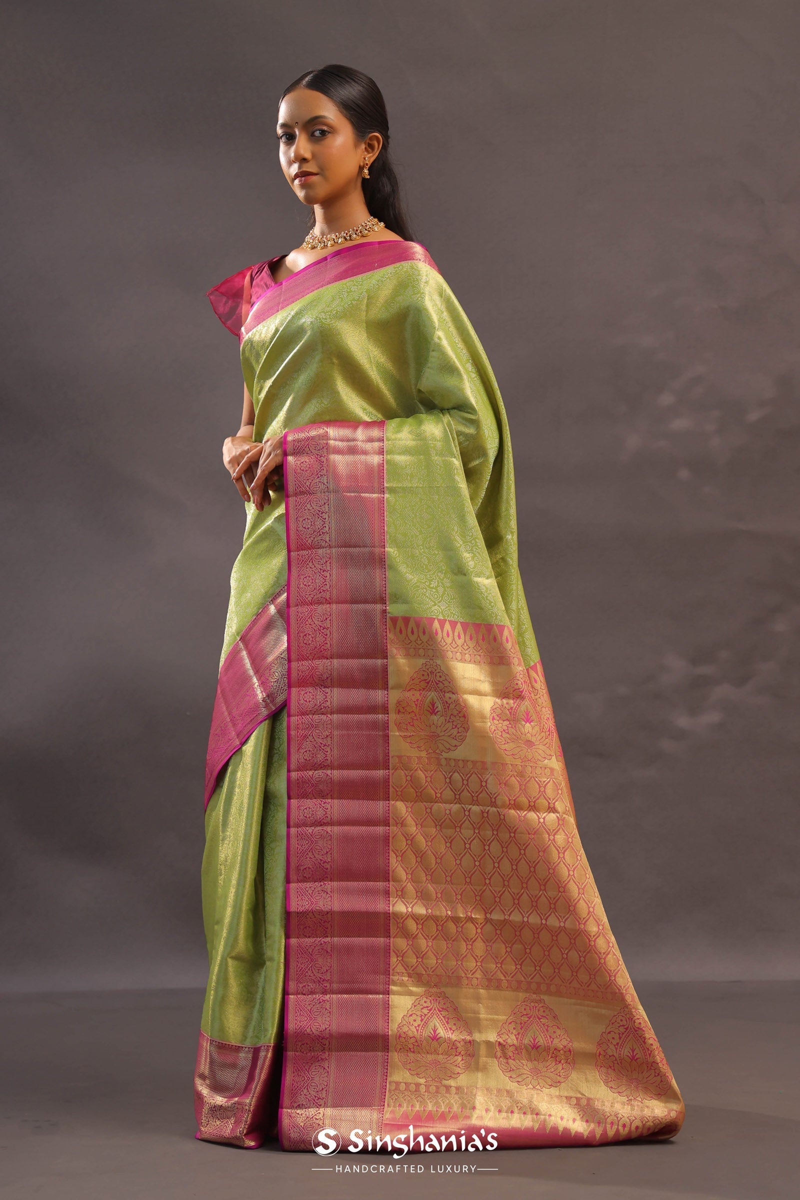 Lime Green Kanjivaram Tissue Silk Saree With Contrast Megenta Border