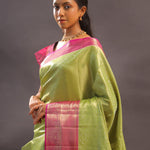 Lime Green Kanjivaram Tissue Silk Saree With Contrast Megenta Border