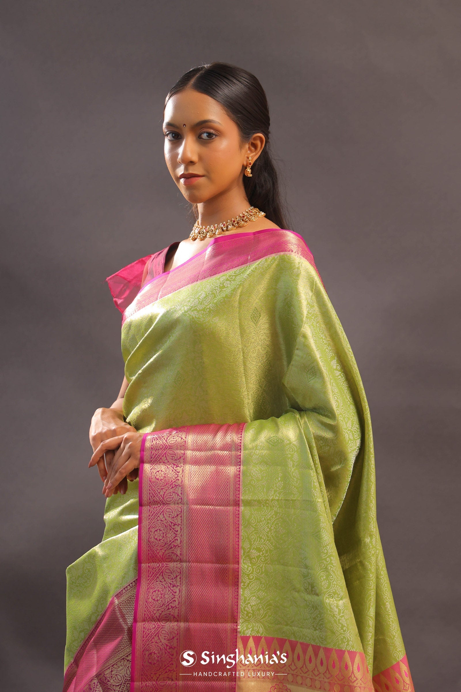 Lime Green Kanjivaram Tissue Silk Saree With Contrast Megenta Border