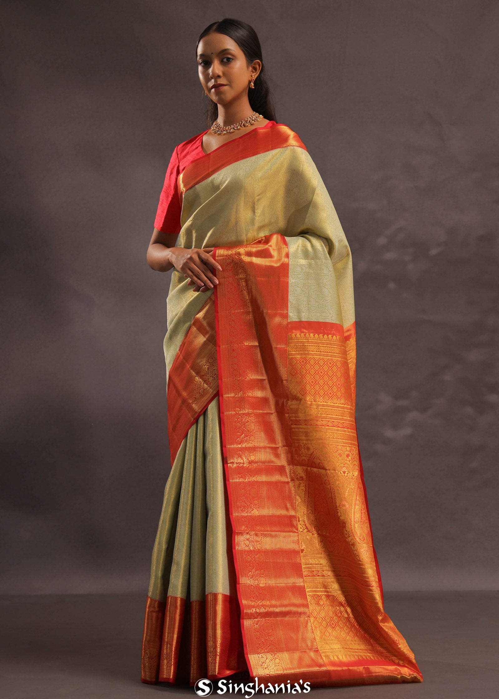 Soft Olive Kanjivaram Tissue Slik Saree With Vibrant Orange Border