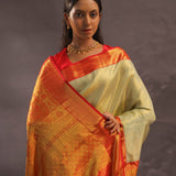 Soft Olive Kanjivaram Tissue Slik Saree With Vibrant Orange Border
