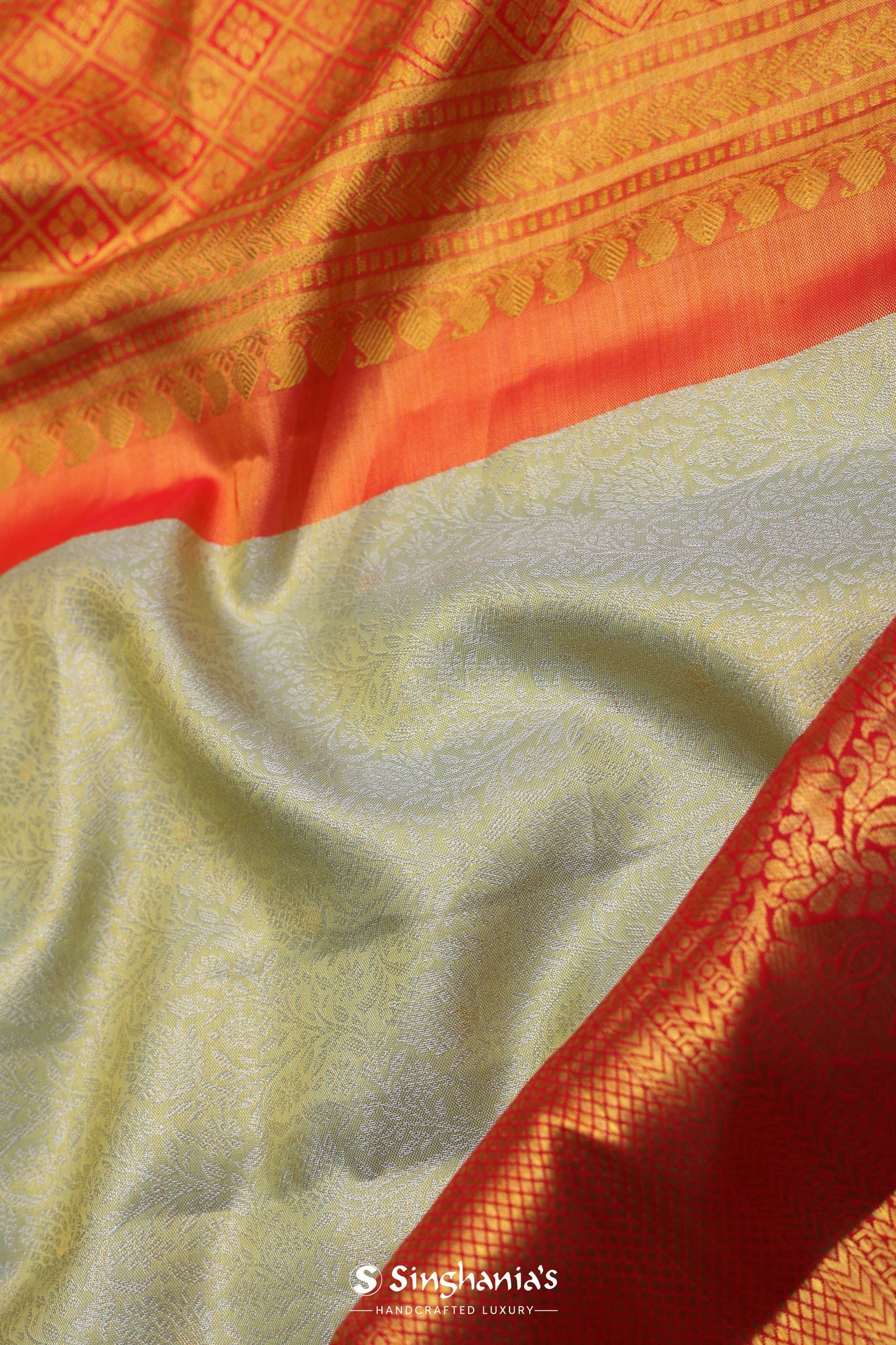 Soft Olive Kanjivaram Tissue Slik Saree With Vibrant Orange Border