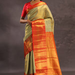 Dark Cream Kanjivaram Tissue Silk Saree With Vibrant Orange Border