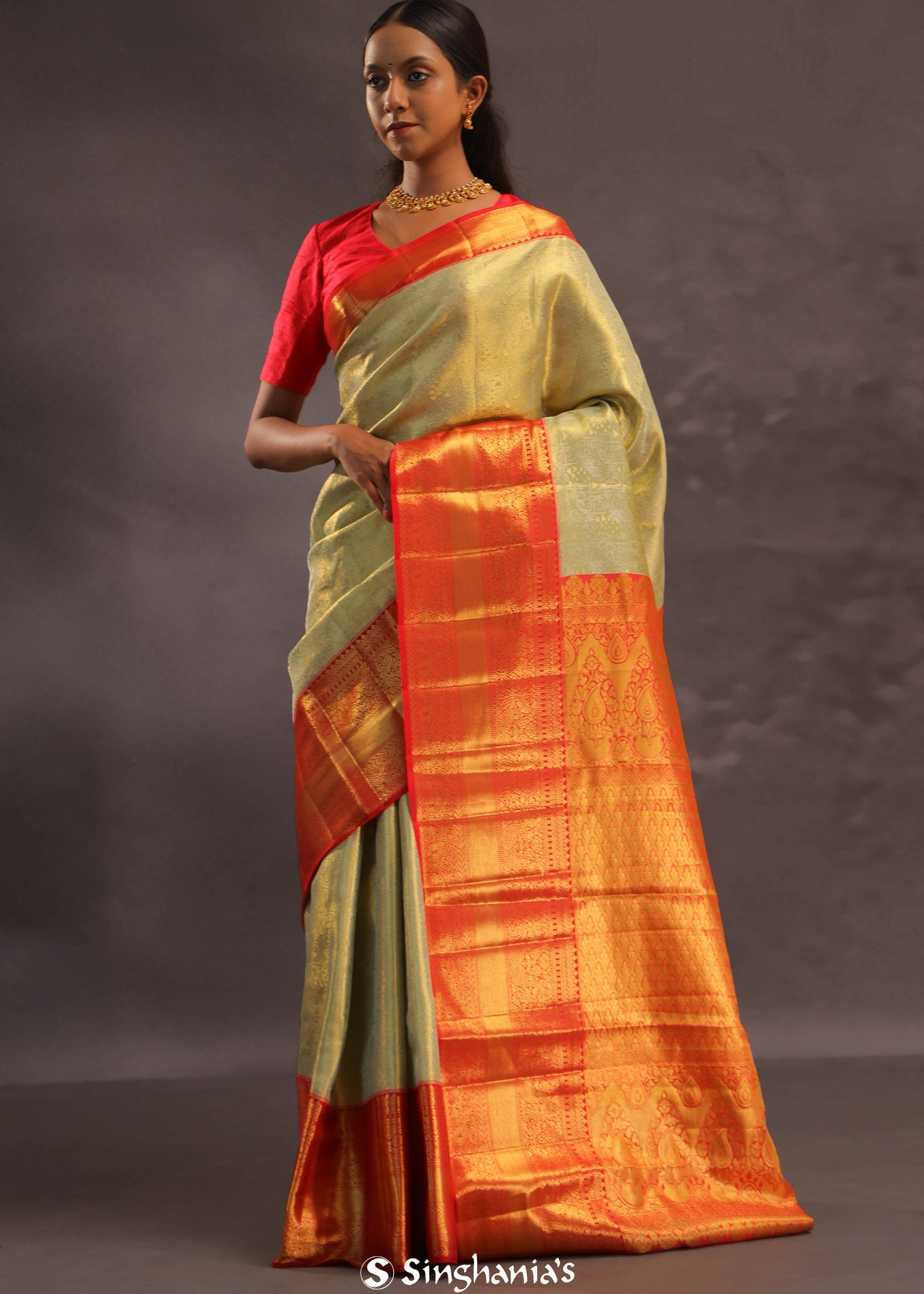 Dark Cream Kanjivaram Tissue Silk Saree With Vibrant Orange Border