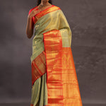 Dark Cream Kanjivaram Tissue Silk Saree With Vibrant Orange Border
