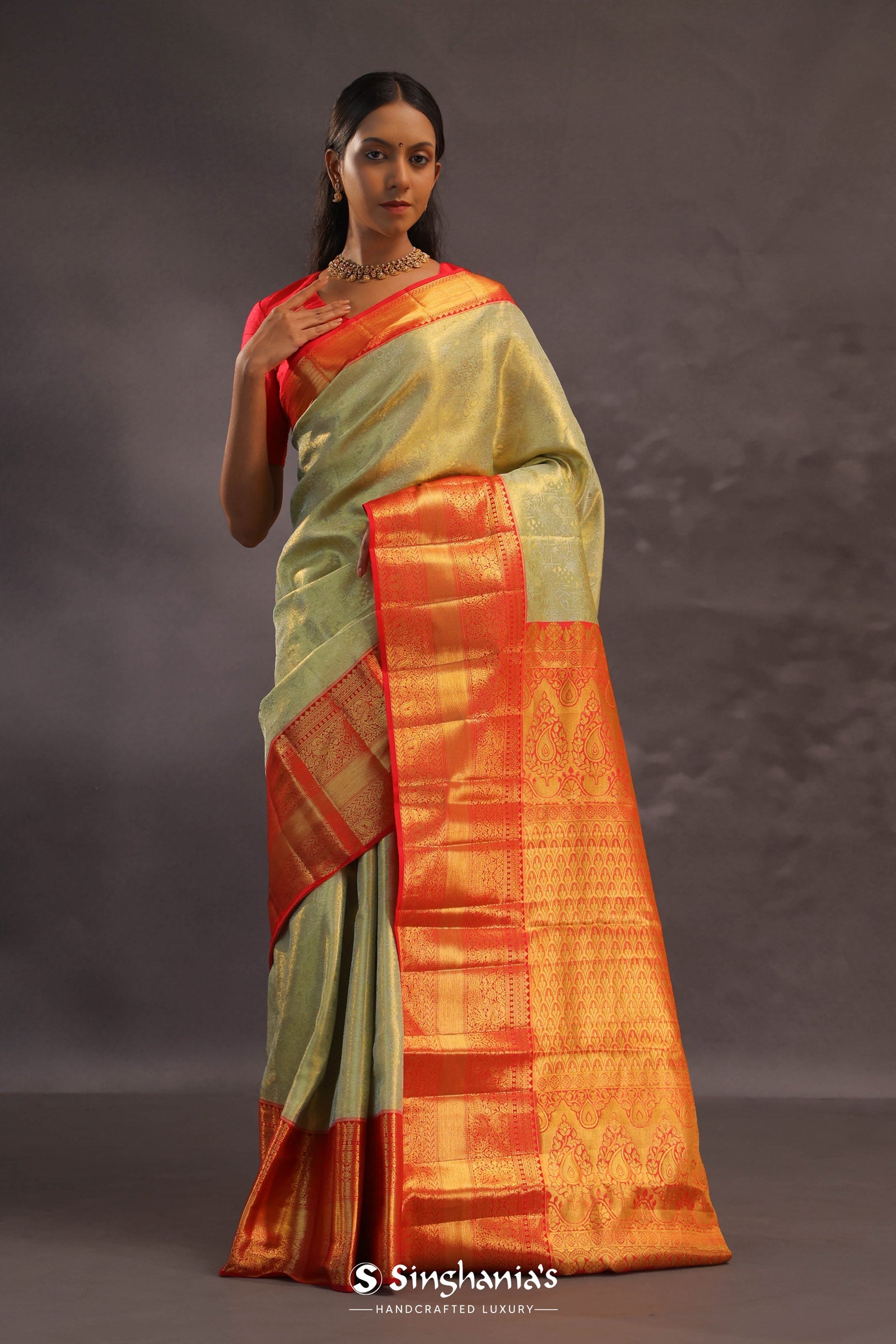 Dark Cream Kanjivaram Tissue Silk Saree With Vibrant Orange Border