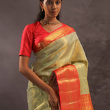 Dark Cream Kanjivaram Tissue Silk Saree With Vibrant Orange Border