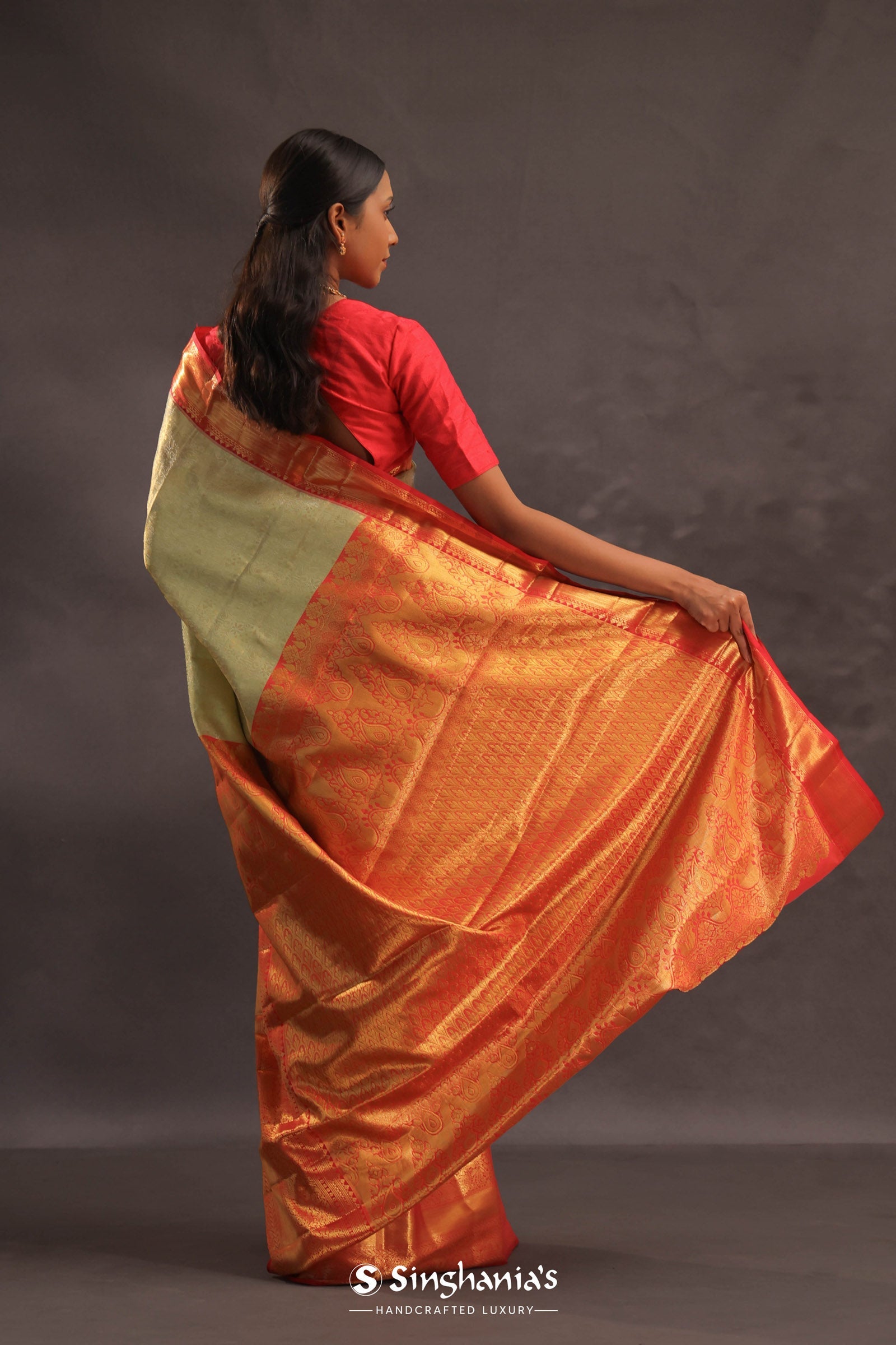 Dark Cream Kanjivaram Tissue Silk Saree With Vibrant Orange Border