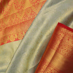 Dark Cream Kanjivaram Tissue Silk Saree With Vibrant Orange Border