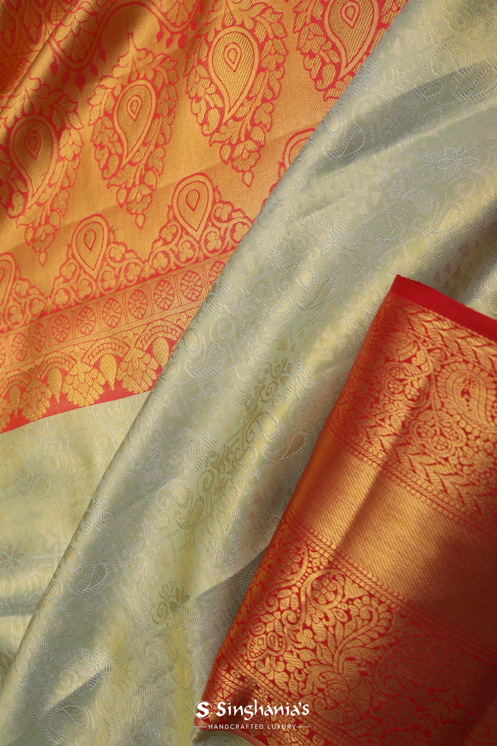 Dark Cream Kanjivaram Tissue Silk Saree With Vibrant Orange Border