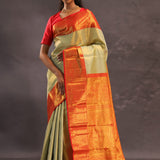 Beige Kanjivaram Tissue Silk Saree With Contrast Vibrant Orange Border