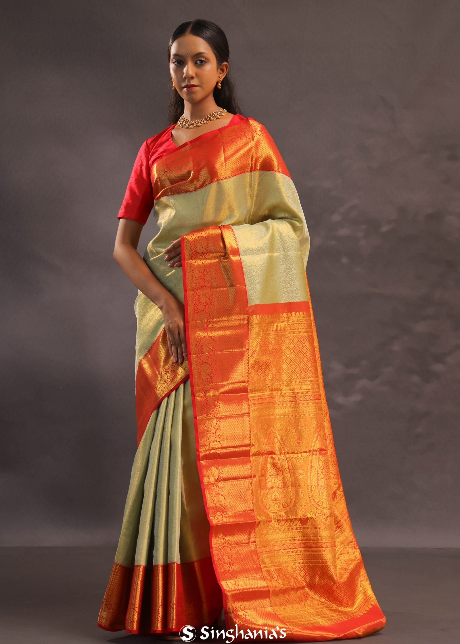 Beige Kanjivaram Tissue Silk Saree With Contrast Vibrant Orange Border
