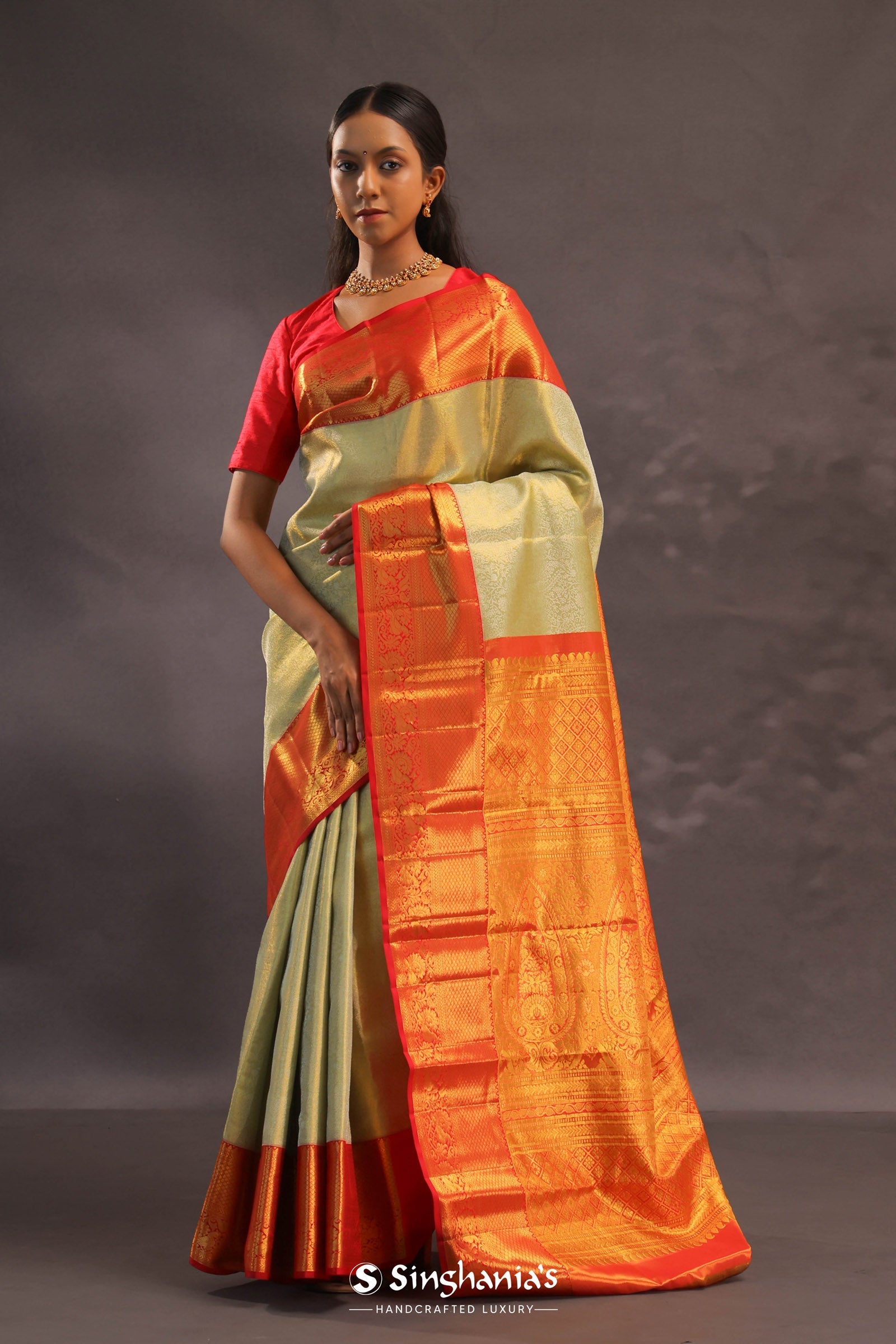 Beige Kanjivaram Tissue Silk Saree With Contrast Vibrant Orange Border