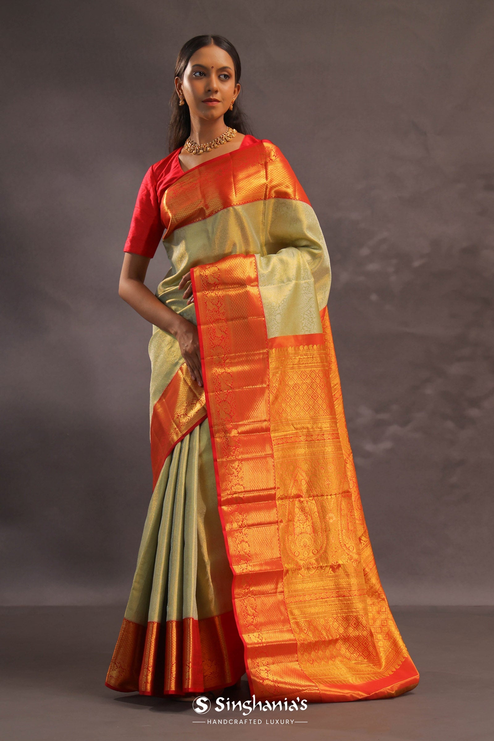 Beige Kanjivaram Tissue Silk Saree With Contrast Vibrant Orange Border