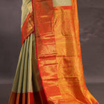 Beige Kanjivaram Tissue Silk Saree With Contrast Vibrant Orange Border