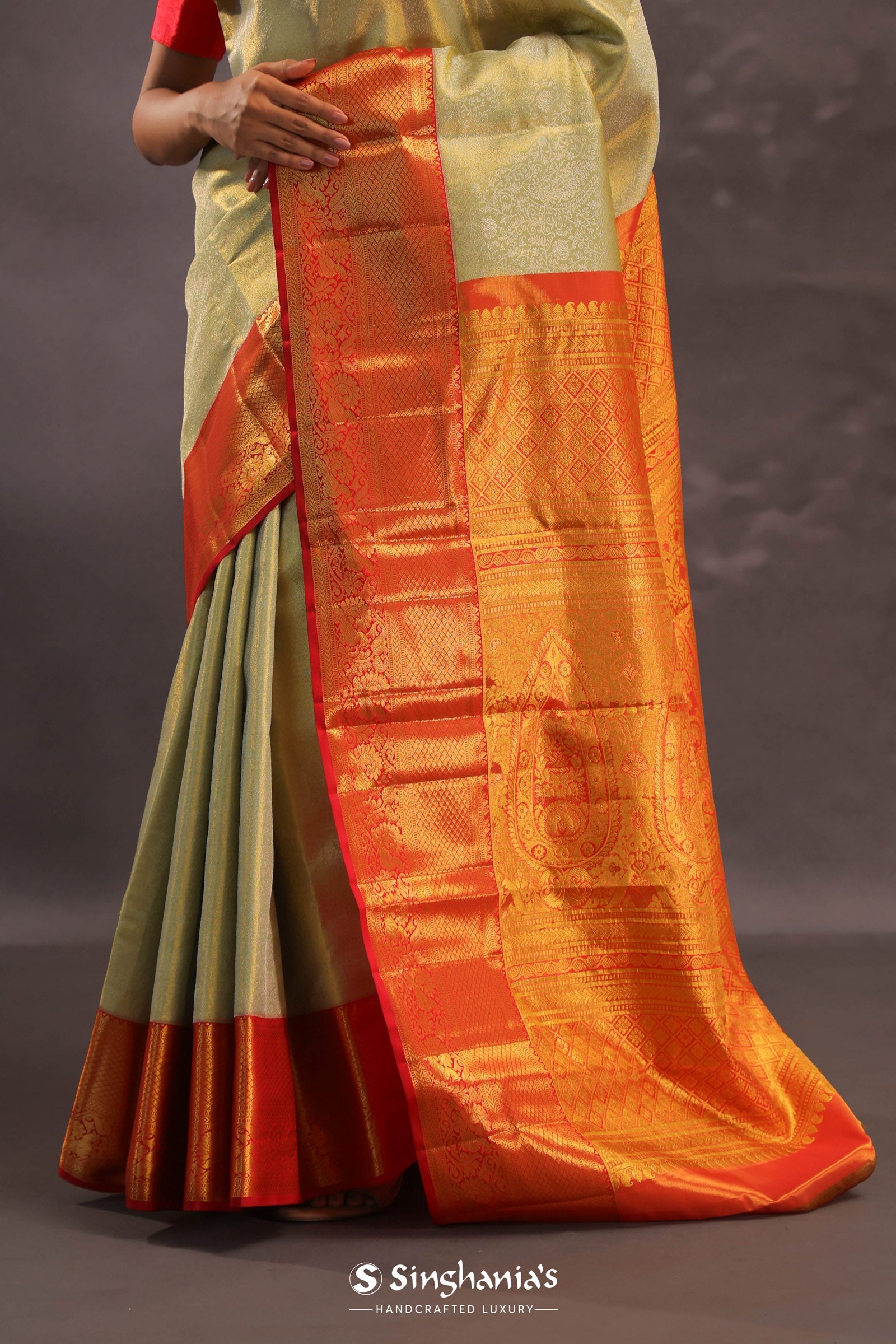 Beige Kanjivaram Tissue Silk Saree With Contrast Vibrant Orange Border