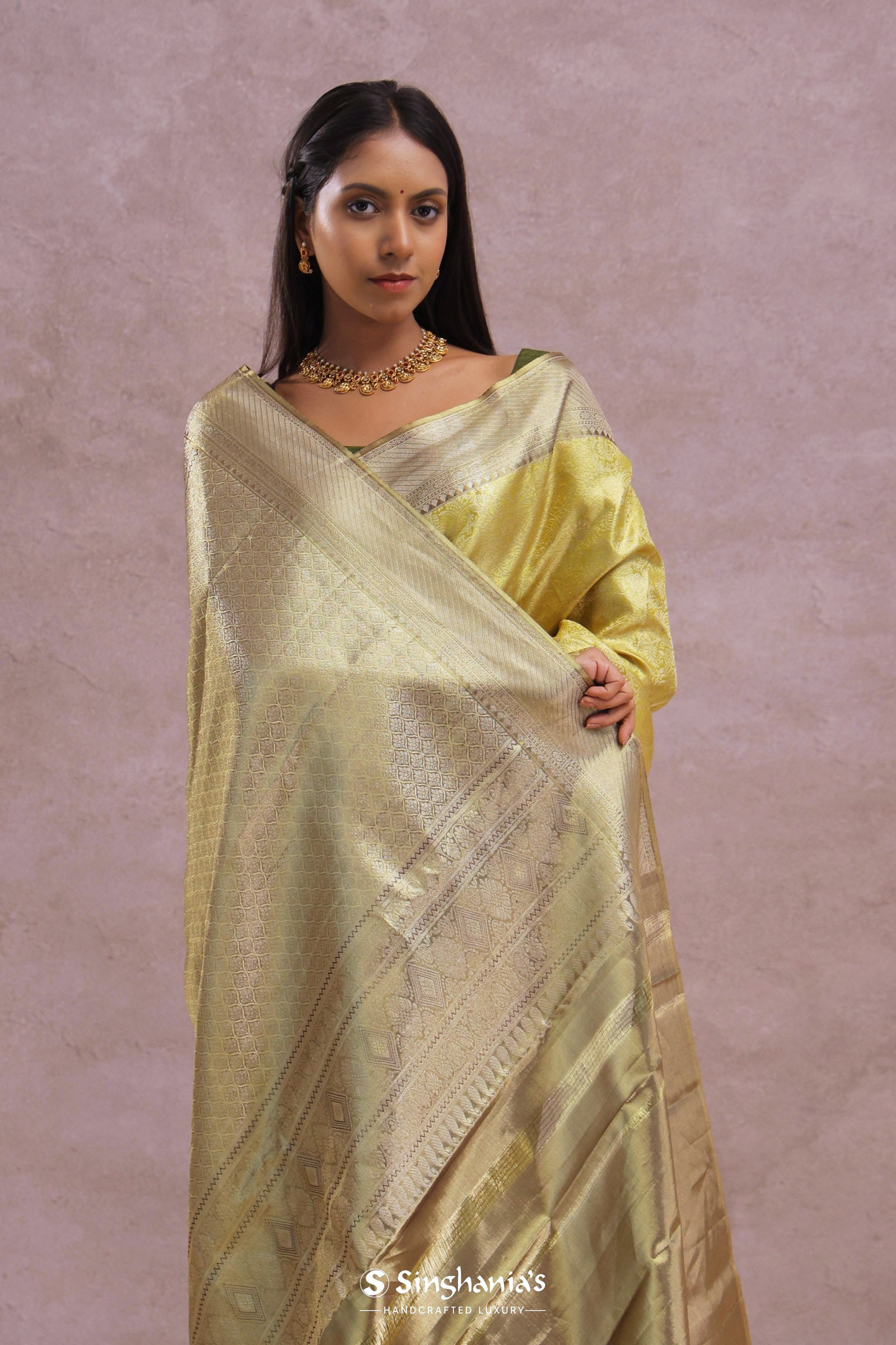 Golden Kanjivaram Tissue Saree With Contrast Green Border