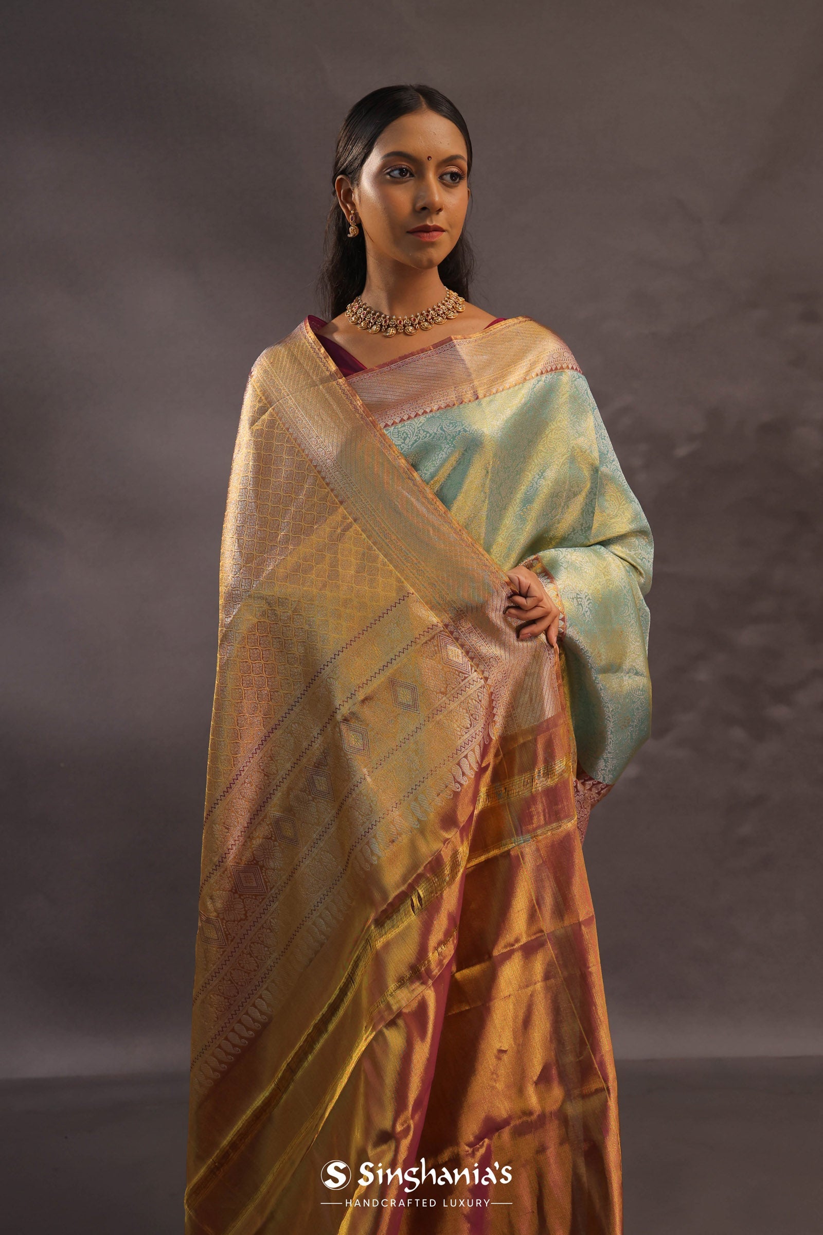 Mint Green Kanjivaram Tissue Silk Saree With Brown Border
