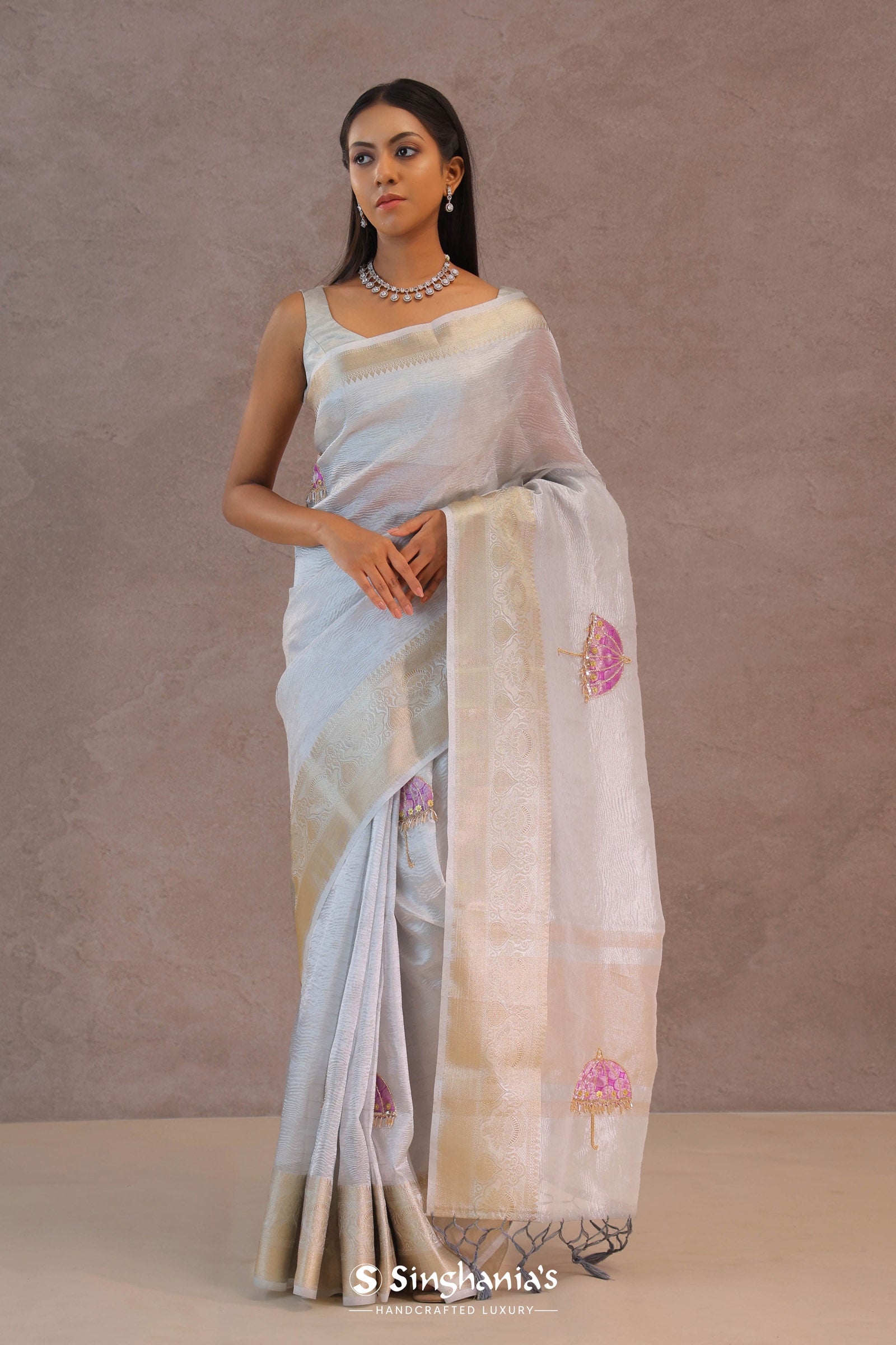 White Crush Tissue Saree With Purple Butta'S