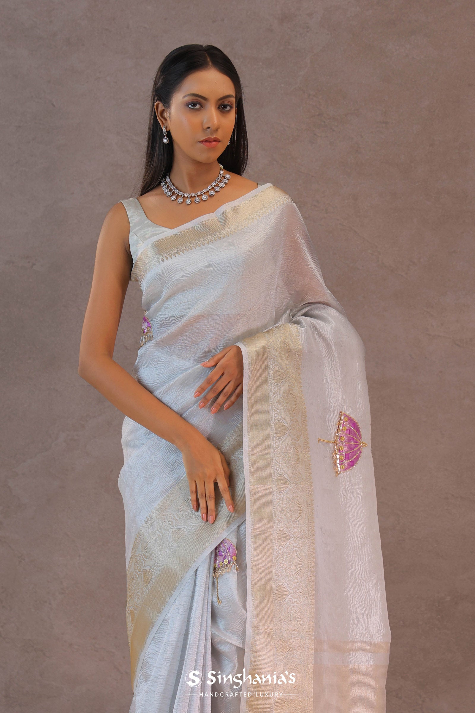 White Crush Tissue Saree With Purple Butta'S