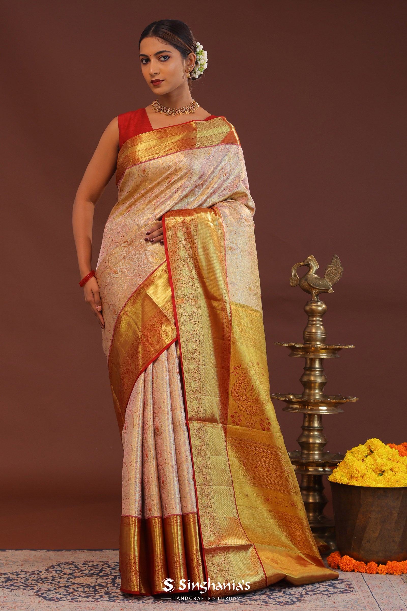Soft Pink Kanjivaram Tissue Saree With Contrast Red Border