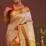 Soft Pink Kanjivaram Tissue Saree With Contrast Red Border