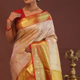 Soft Pink Kanjivaram Tissue Saree With Contrast Red Border