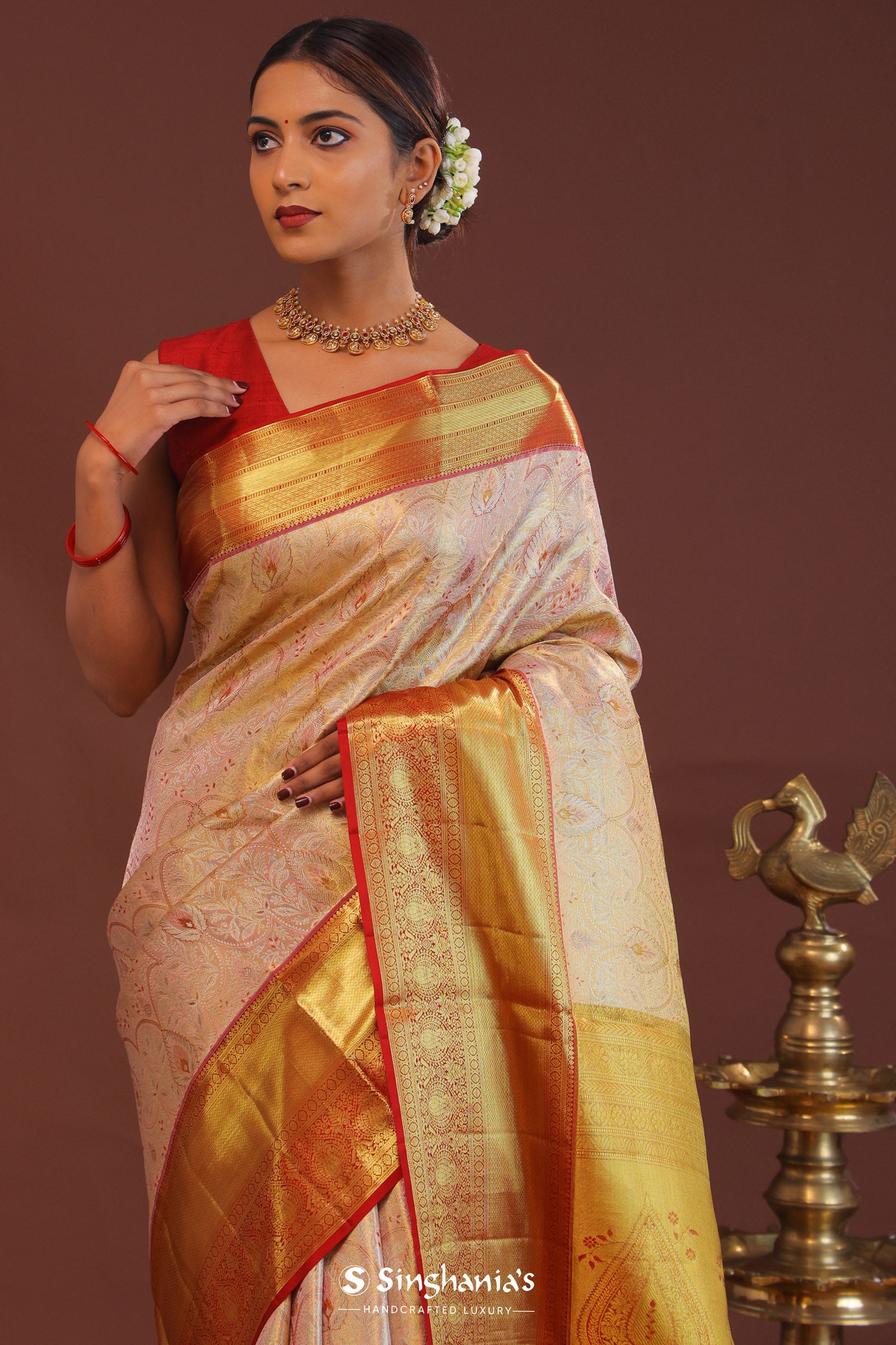 Soft Pink Kanjivaram Tissue Saree With Contrast Red Border