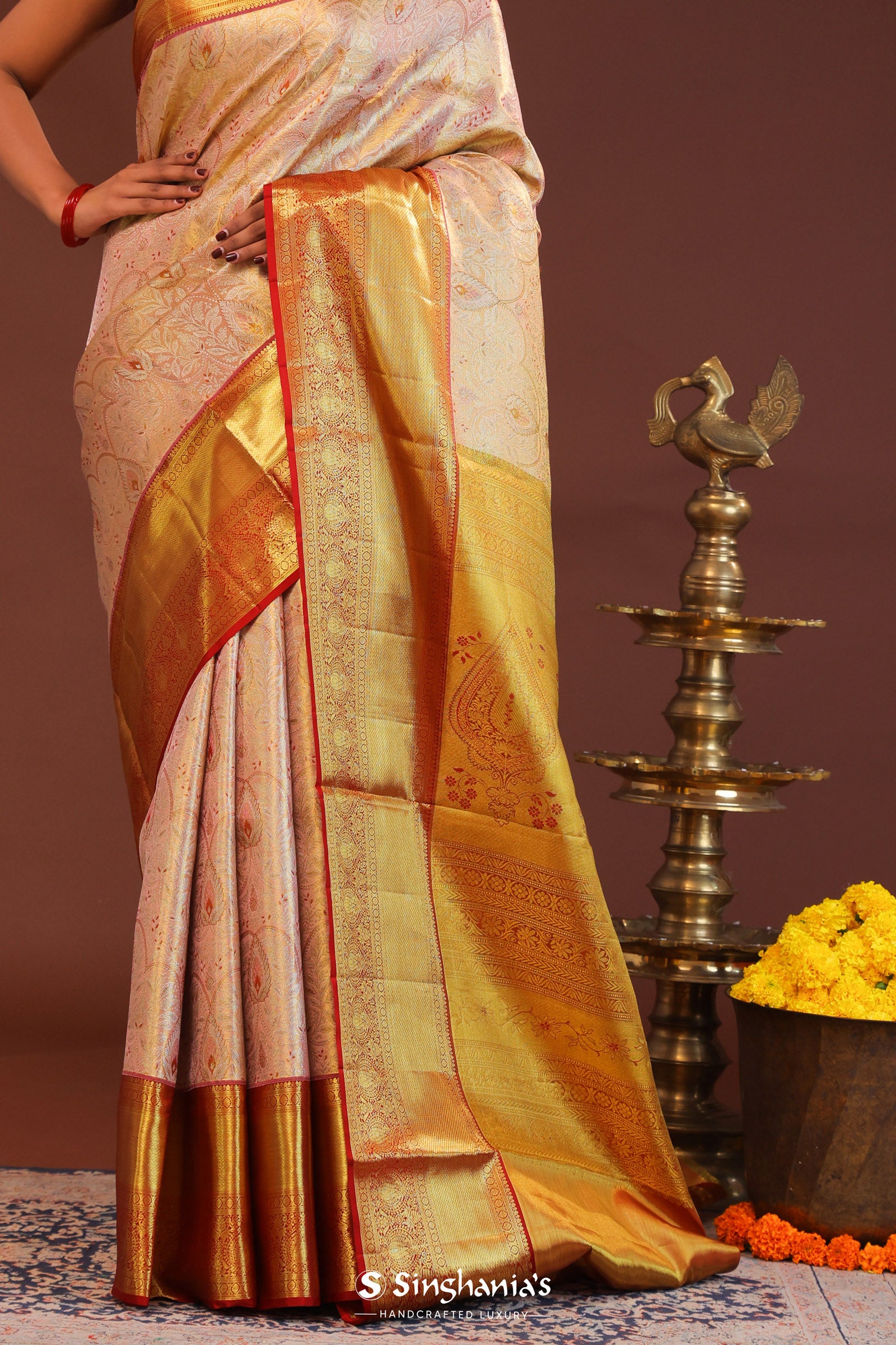 Soft Pink Kanjivaram Tissue Saree With Contrast Red Border