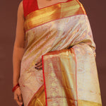 Soft Pink Kanjivaram Tissue Saree With Contrast Red Border