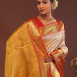 Soft Pink Kanjivaram Tissue Saree With Contrast Red Border