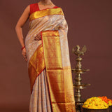 Beige Kanjivaram Tissue Saree With Contrast Red Border