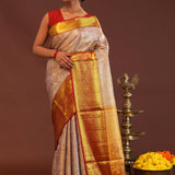 Beige Kanjivaram Tissue Saree With Contrast Red Border