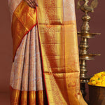 Beige Kanjivaram Tissue Saree With Contrast Red Border