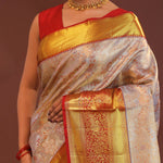 Beige Kanjivaram Tissue Saree With Contrast Red Border