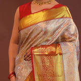 Beige Kanjivaram Tissue Saree With Contrast Red Border