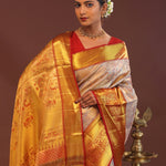 Beige Kanjivaram Tissue Saree With Contrast Red Border