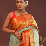 Pistachio Green Kanjivaram Tissue Saree With Contrast Orange Border