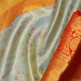 Pistachio Green Kanjivaram Tissue Saree With Contrast Orange Border