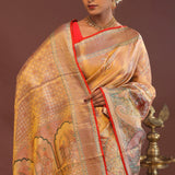 Peach Kanjivaram Saree With Orange Edge And Designer Border