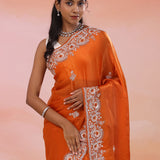 Rusty Red Satin Crepe Saree With Fancy Border