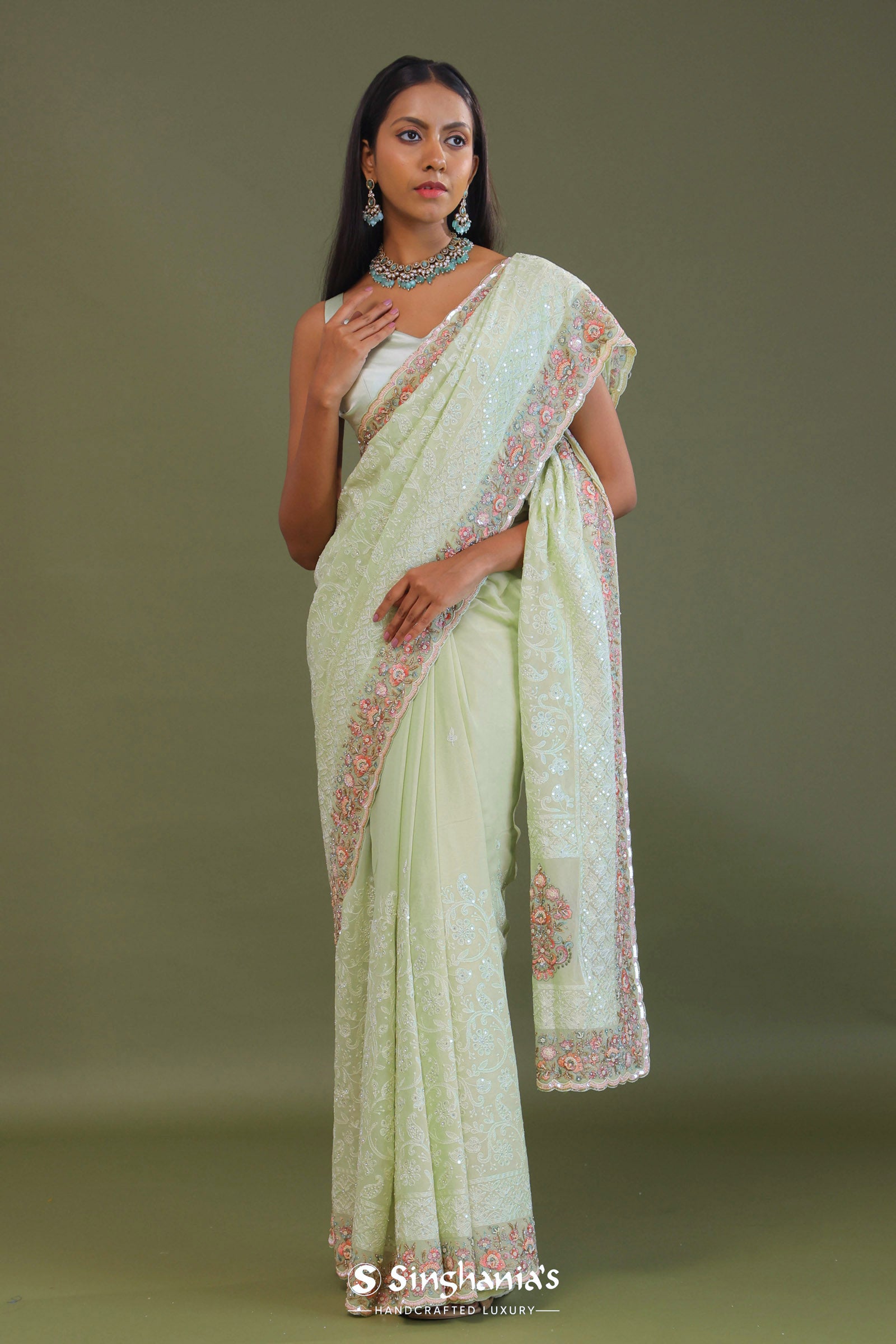 Soft Pistachio Green Georgette Embroidery Saree With Scallop Border