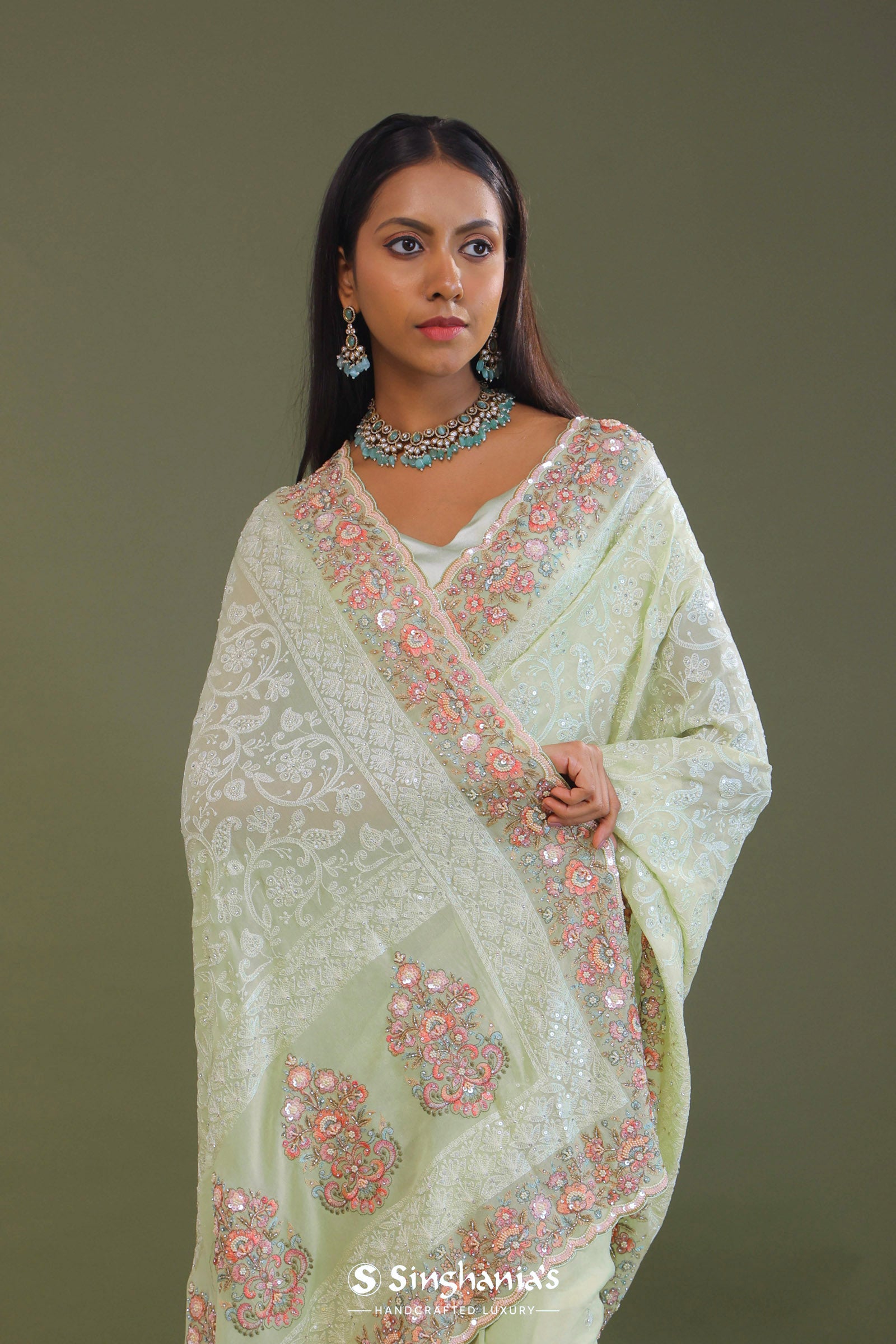 Soft Pistachio Green Georgette Embroidery Saree With Scallop Border
