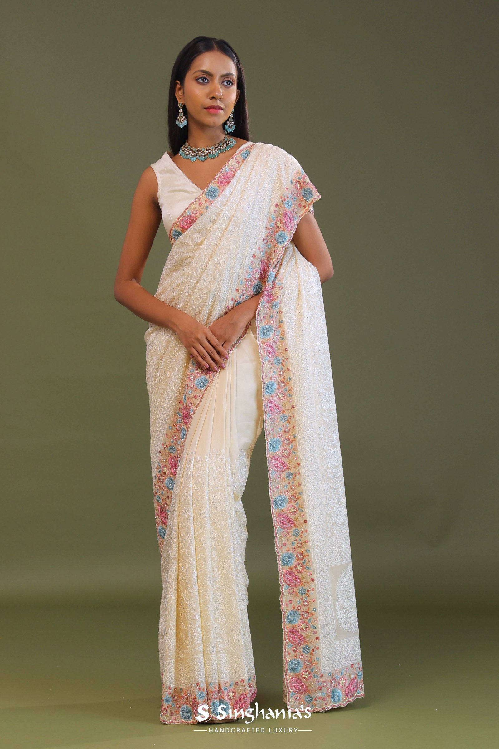 Cream Georgette Embroidery Saree With Scallop Border