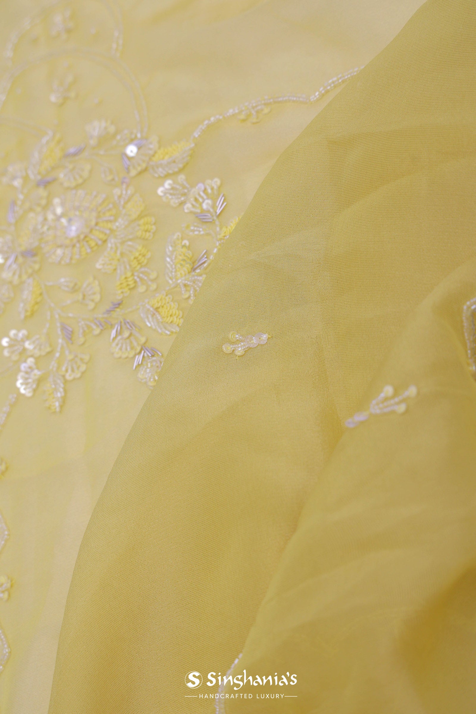 Pastel Yellow Organza Embroidery Saree With Scallop Border