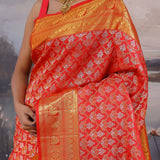 Vibrant Orange Kanjivaram Saree With Ogee-Shape Design