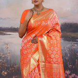 Vibrant Orange Kanjivaram Saree With Floral Design