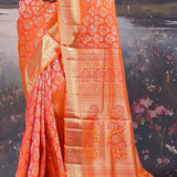 Vibrant Orange Kanjivaram Saree With Floral Design