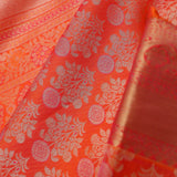 Vibrant Orange Kanjivaram Saree With Floral Design