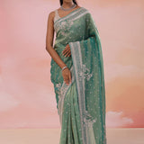 Green Georgette Tissue Saree With Fancy Border